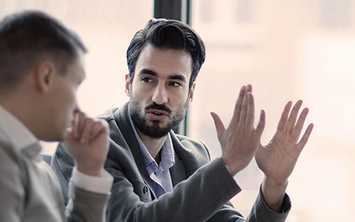 man gesturing with hands