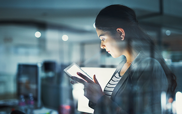 woman holding tablet