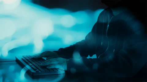 Person sitting at keyboard