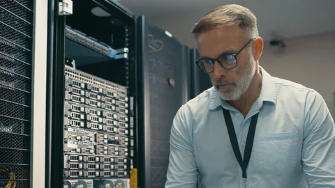 IT employee troubleshooting in datacenter