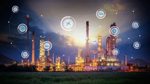 oil and gas facility at night with overlay of icons