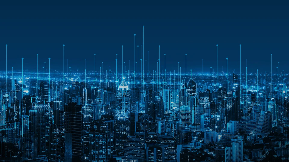 Blue treatment of city at night with light blue outlines